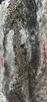 Sphalerite, galena, and pyrite with quartz in late-stage polymetallic veins in TCR-1